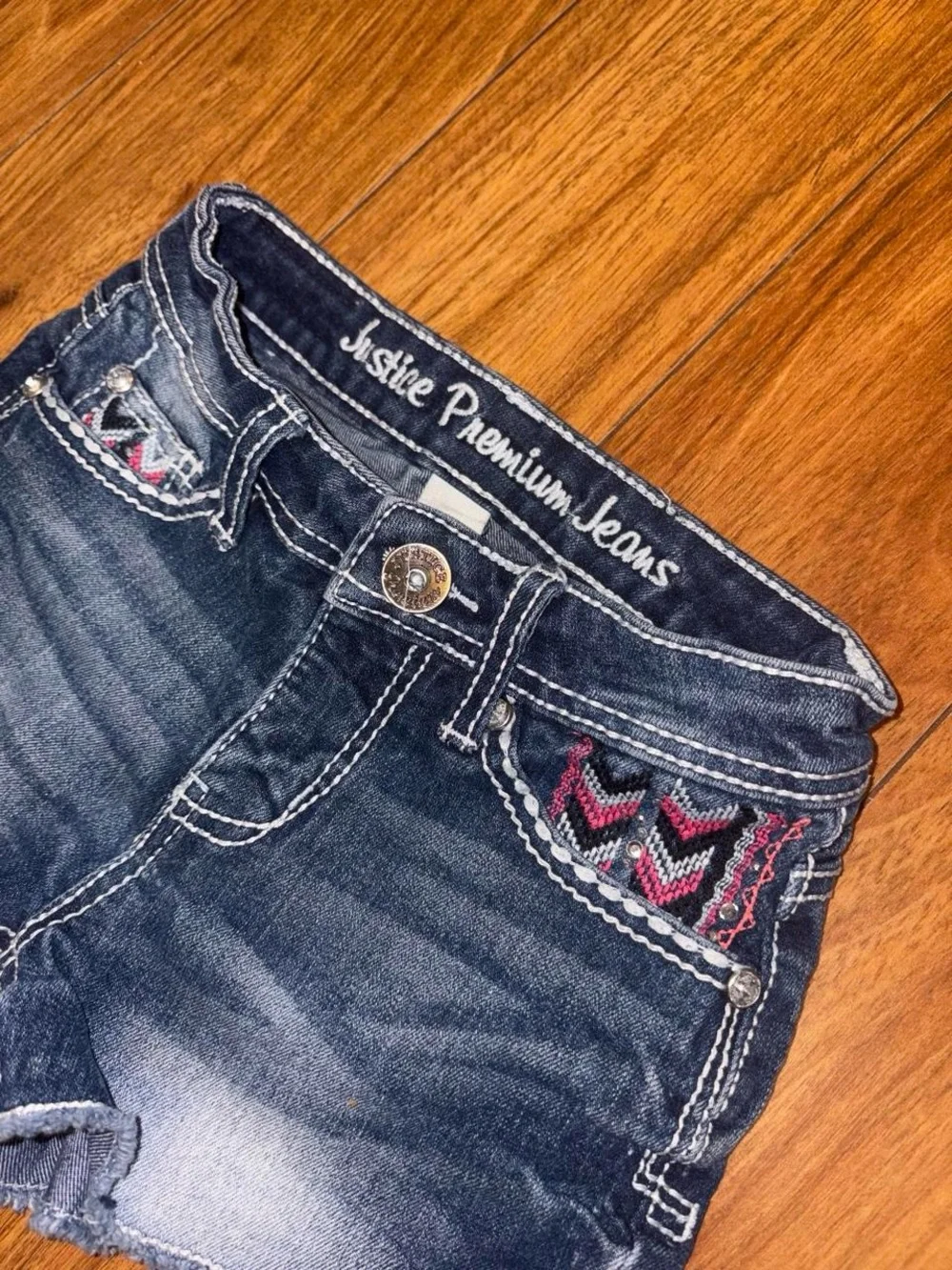 Y2K Justice navy blue denim shorts with pink and black chevron embroidery